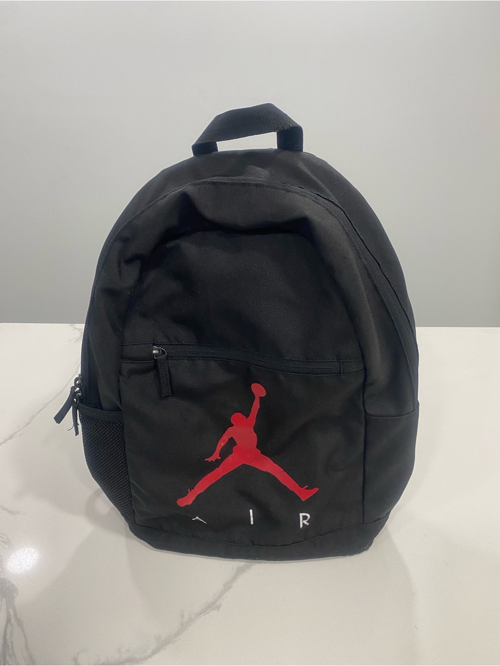 Nike Black Backpack with Red Jumpman Graphic